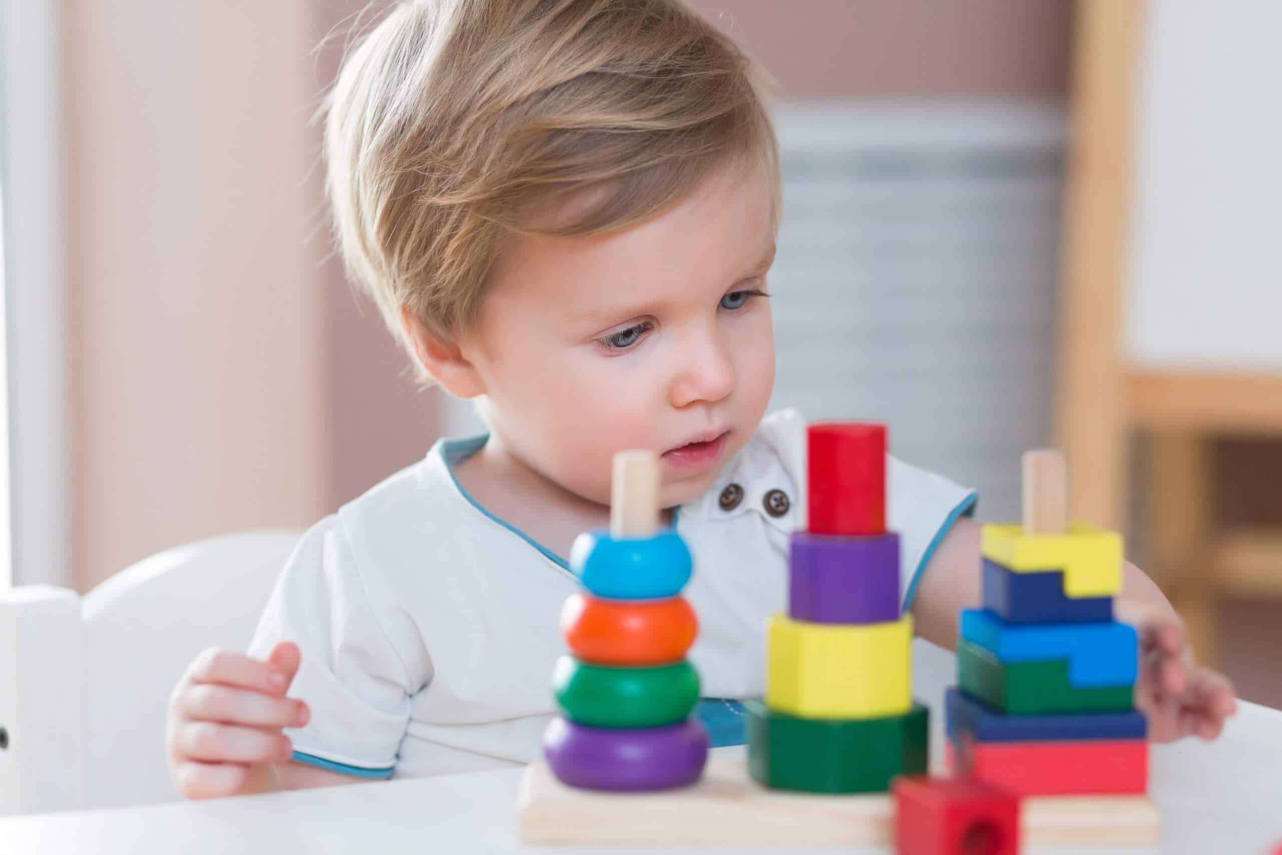 boy playing with blocks