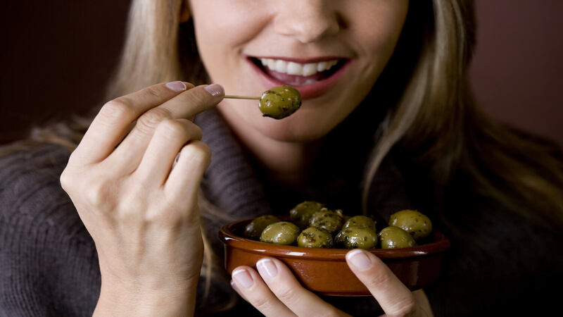 woman-eating-olives