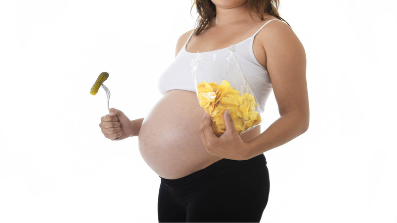 pregnant woman with banana chips