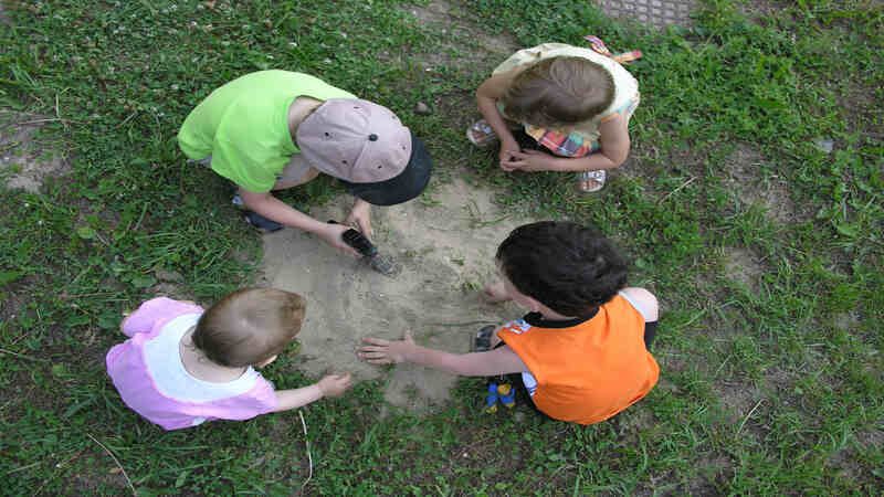 Letting Your Baby Play With Sand in The Playground