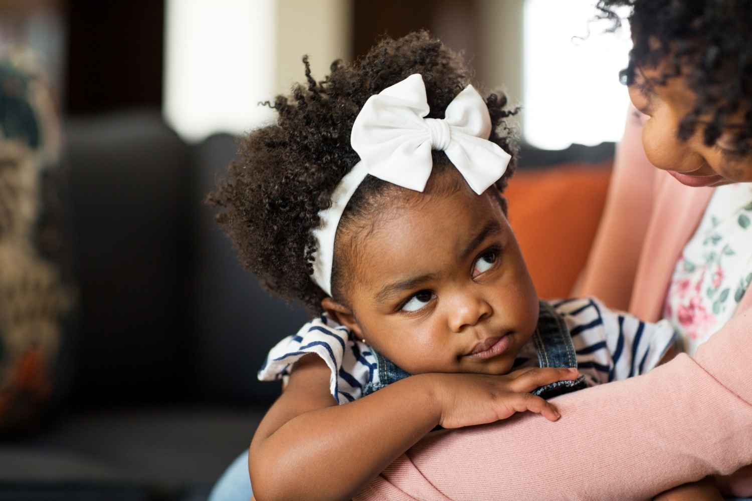 toddler looking at mom