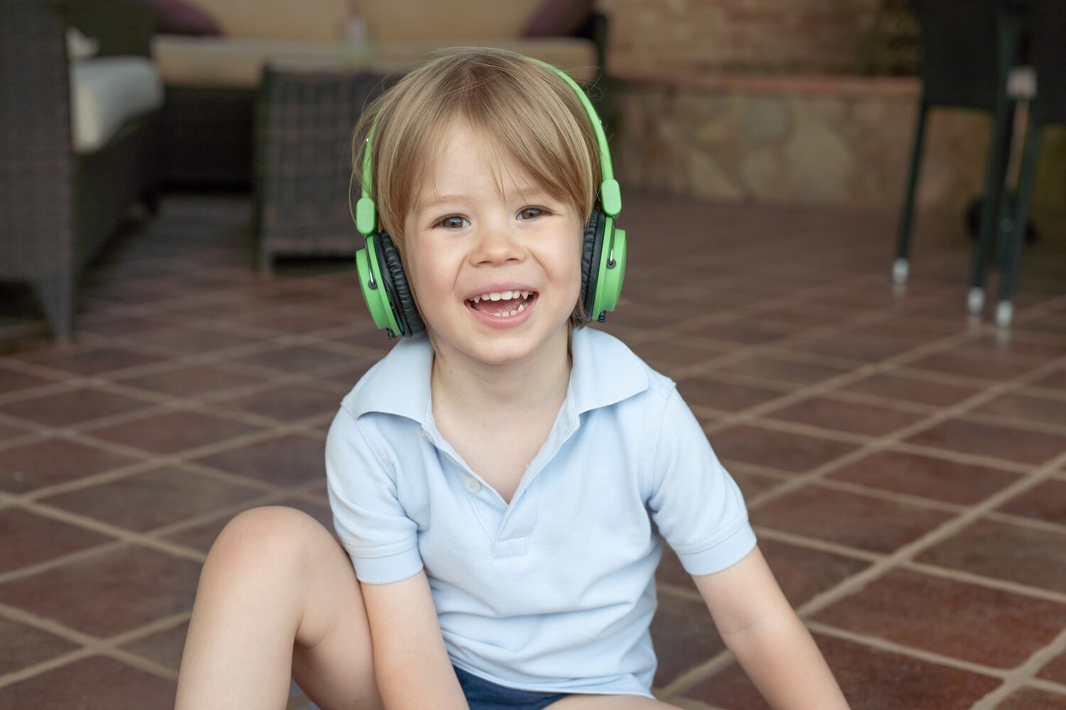 A child wearing noise cancelling headphones
