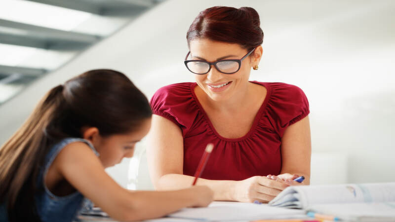 Patient parent teaching children