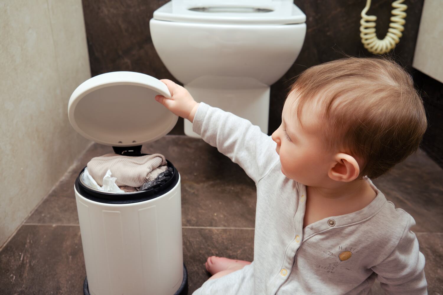 As a bathroom safety tip for toddlers install Locks on Trash Bins