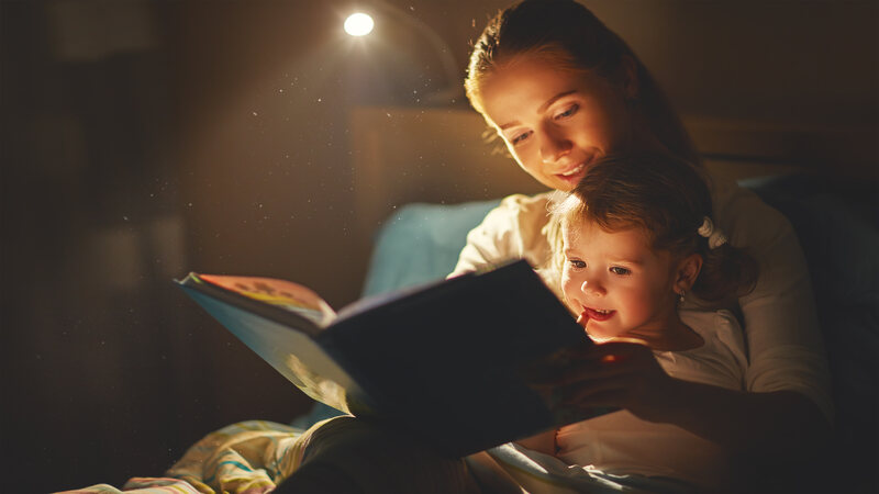 Reading bedtime stories to children