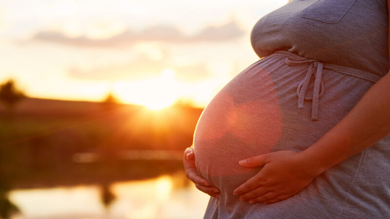 pregnant woman getting sunlight